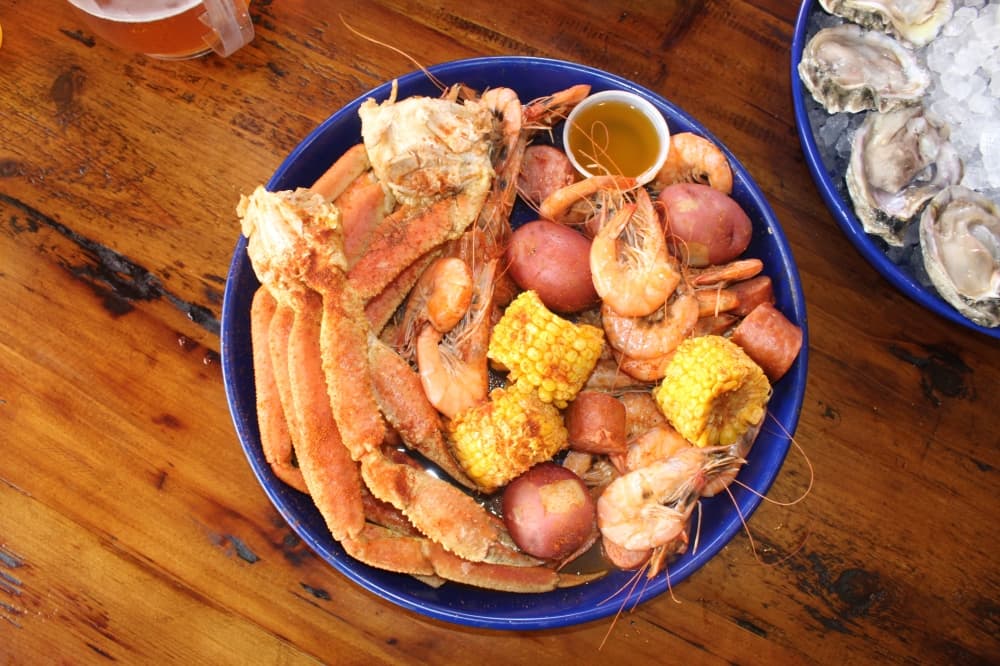 A variety of seafood dishes are served at Big Shucks and Aw Shucks, including snow crab legs. (Michael Crouchley/Community Impact)