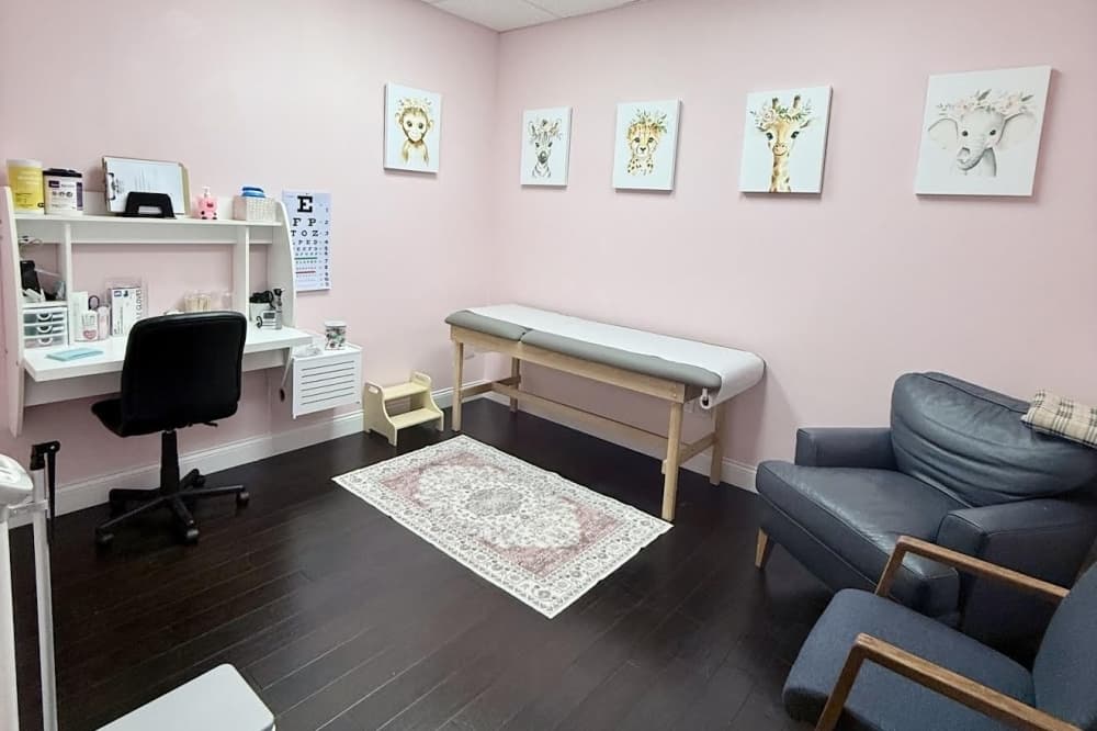 Pink pediatric exam room