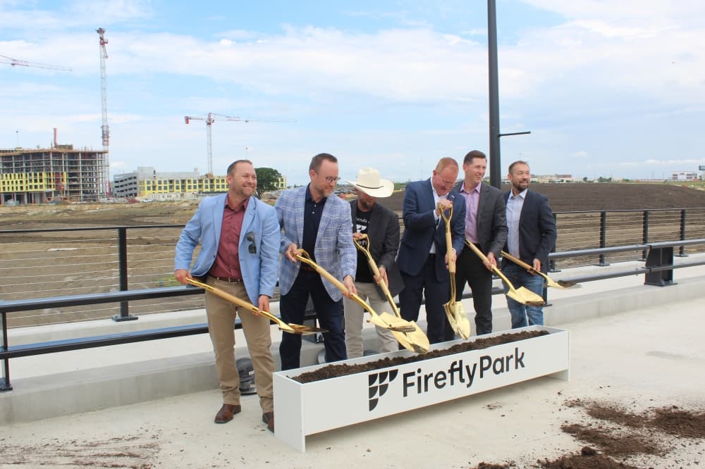 Wilks Development, community leaders and city officials threw dirt at a May 28 groundbreaking ceremony for Firefly Park. (Jacquelyn Burrer/Community Impact)
