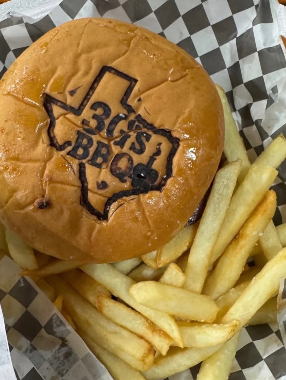 3 G's BBQ logo stamped into a bun 