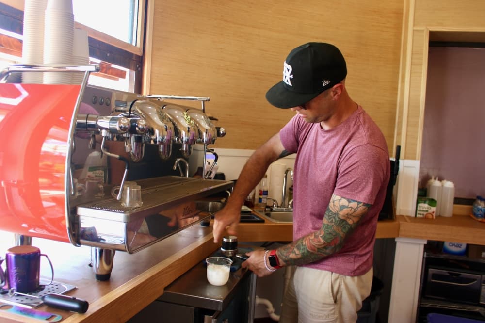 Derek making a drink