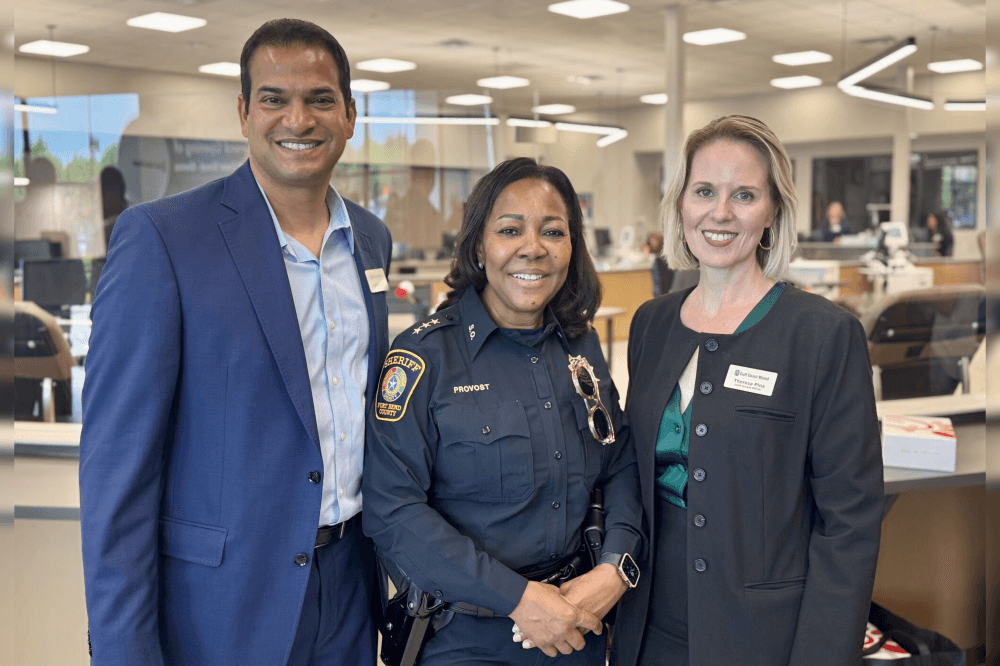 gulf coast blood - sienna managers with police officer