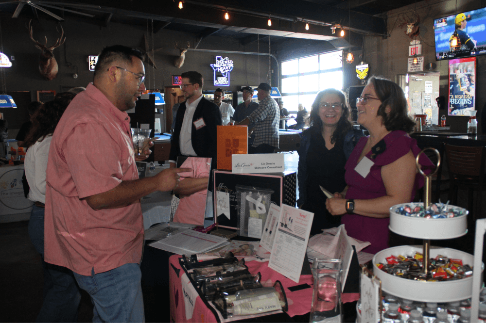 Community members gather in Buda, Texas, to support local entrepreneurs, startups, and small business owners during BEE2B Week.