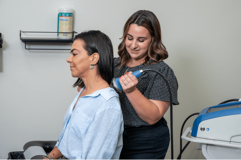 Chiropractic adjustment at Village Chiropractic helping Cypress patients with neck pain, back pain and spinal alignment
