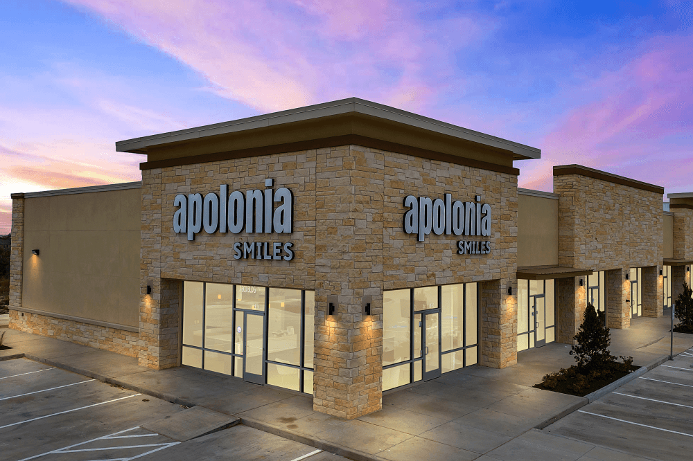 Dentist consulting with patient at Apolonia Smiles in Pflugerville using digital X-rays and AI-assisted diagnostics for personalized dental treatment