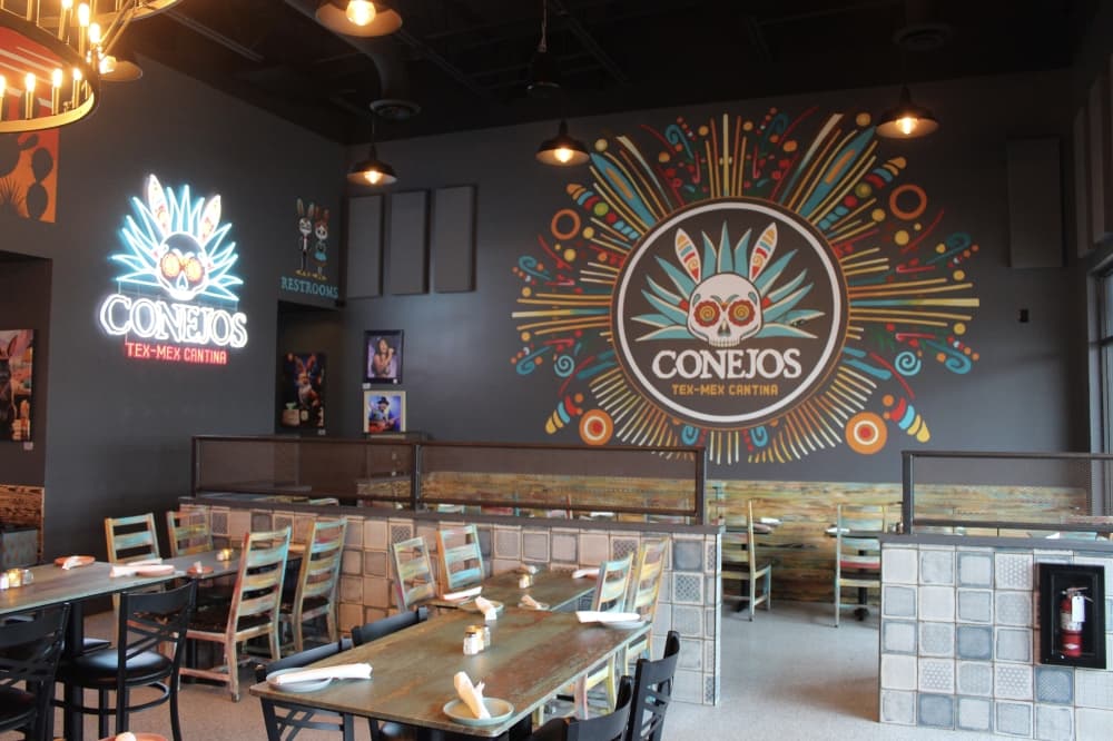 The owners of Conejos Tex-Mex Cantina worked with local artists to curate the atmosphere inside the restaurant, co-owner Bobby Joe Hernandez said. (Daniel Schwalm/Community Impact)