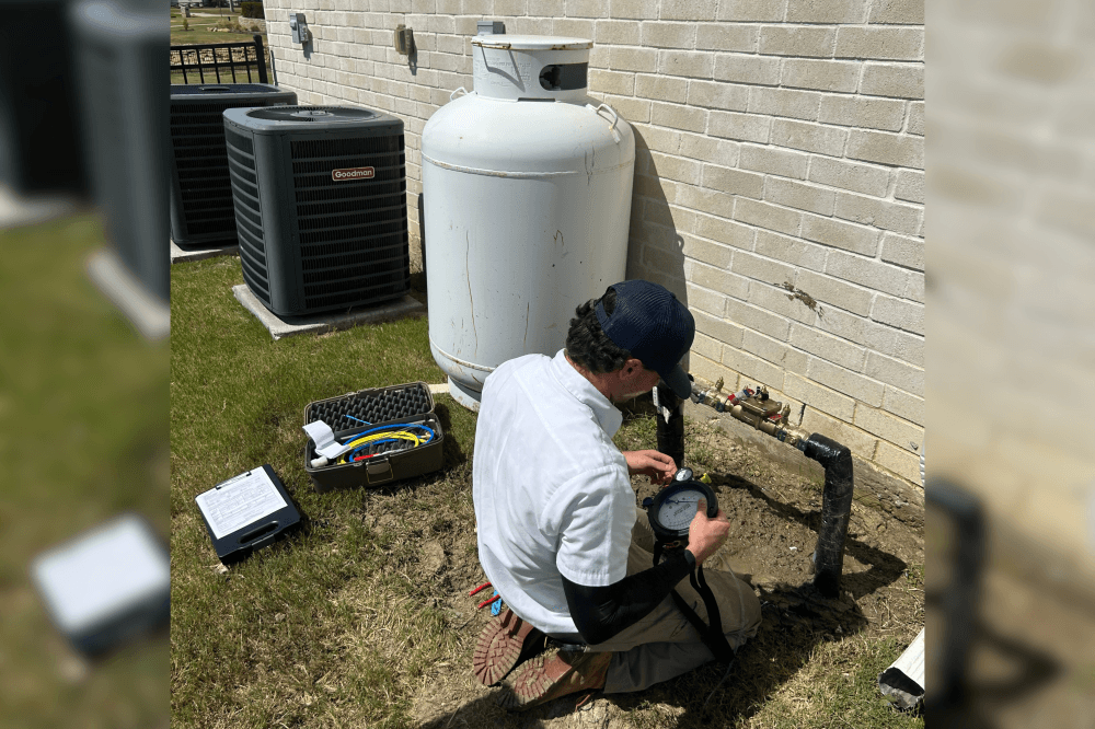 dfw plumber fixing water heater