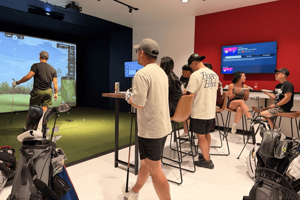 Birdie Central indoor golf simulator facility in Spring Texas featuring golf practice bays, launch monitor technology and 24/7 member access