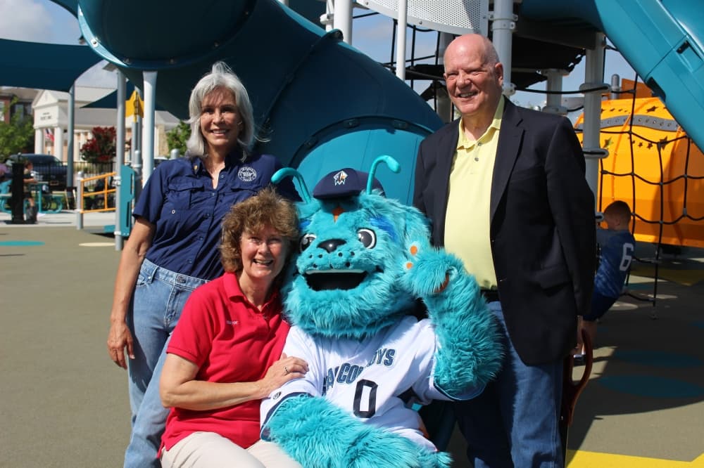Sugar Land Space Cowboys mascot Orion attended the ribbon cutting with county and city officials. (Aubrey Howell/Community Impact)