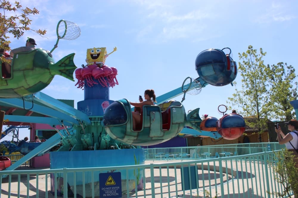 Parkgoers ride the Jellyfish Fields Jamboree at Universal Kids Resort in Frisco on June 18. (Samantha Douty/Community Impact)