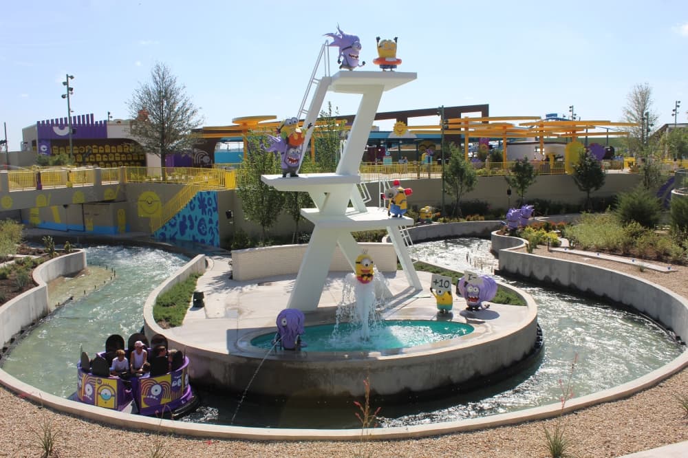 Parkgoers ride the Bello Bay Cruise ride at Universal Kids Resort's Minion vs. Minions land in Frisco on June 18. The park is set to open to the public officially on July 1. (Samantha Douty/Community Impact)