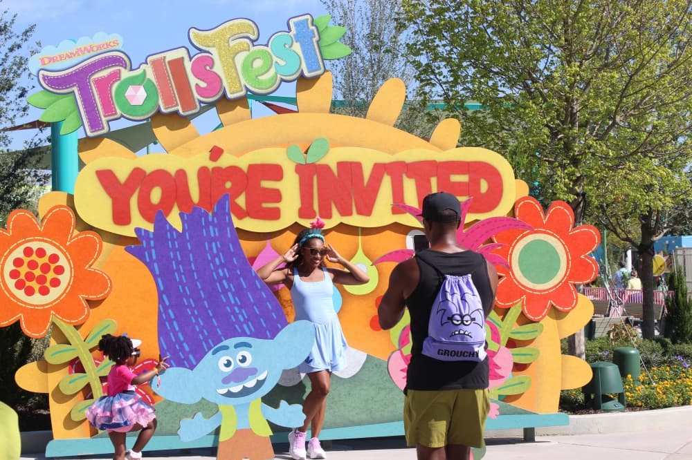 Parkgoers pose for photos with photo spots throughout the park. (Samantha Douty/Community Impact)