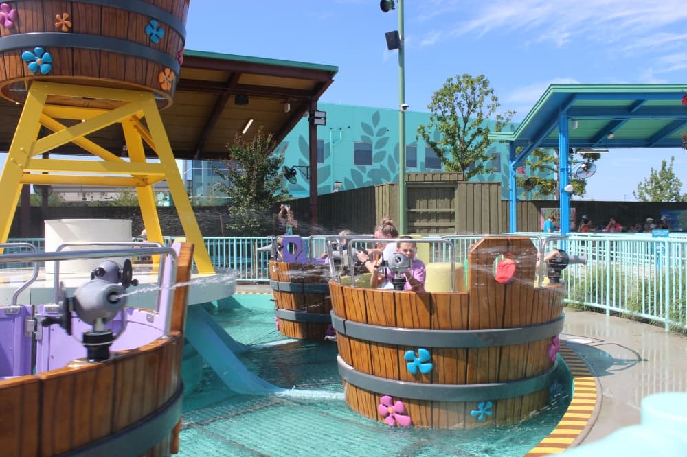 Kids shoot water on the Bobbing Barrels ride at Universal Kids Resort on June 18. (Samantha Douty/Community Impact)