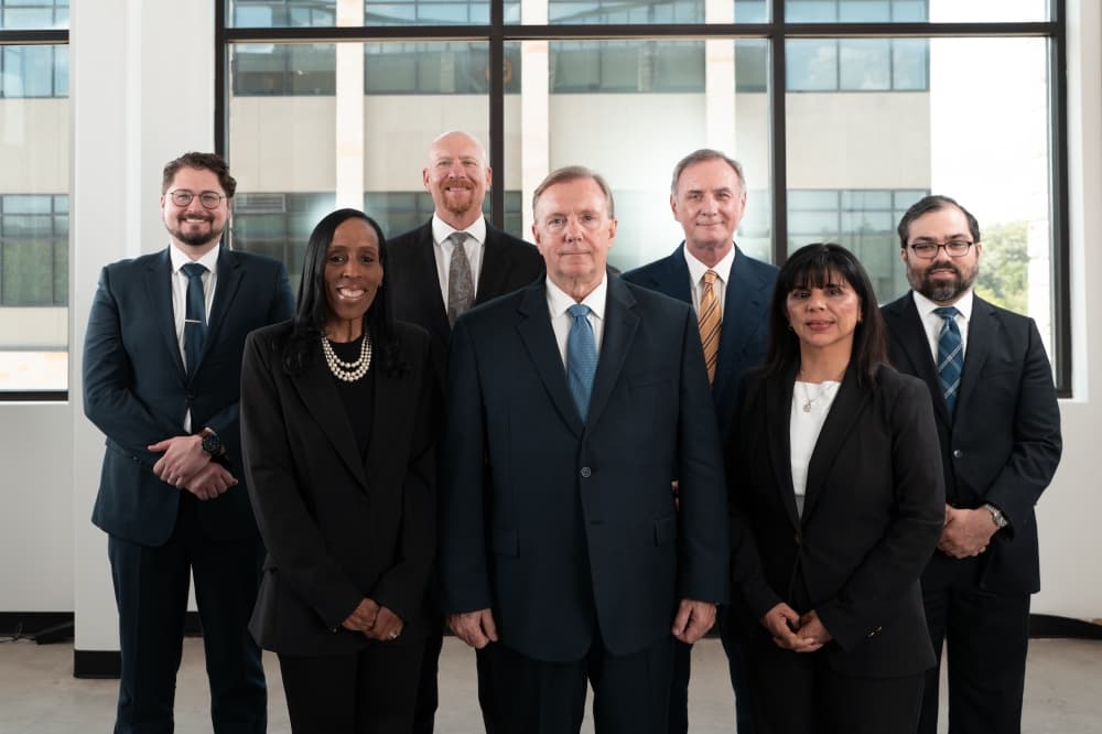 round rock lawyers smiling in team photo