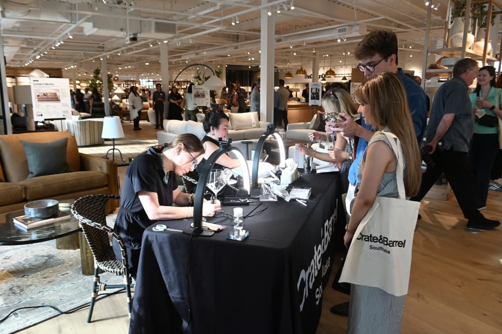At a VIP opening event June 24, there was an engraving station to personalize wine glasses and other items given away at the door.