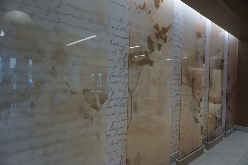 A heritage wall in the hospital lobby features letters written by Mother Elizabeth Ann Seton, the founder of the Sisters of Charity. (Jessica McLaren/Community Impact)