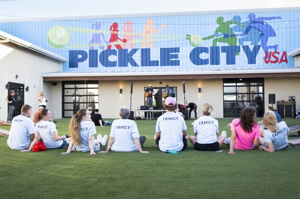 pickle city usa visitors watching a concert