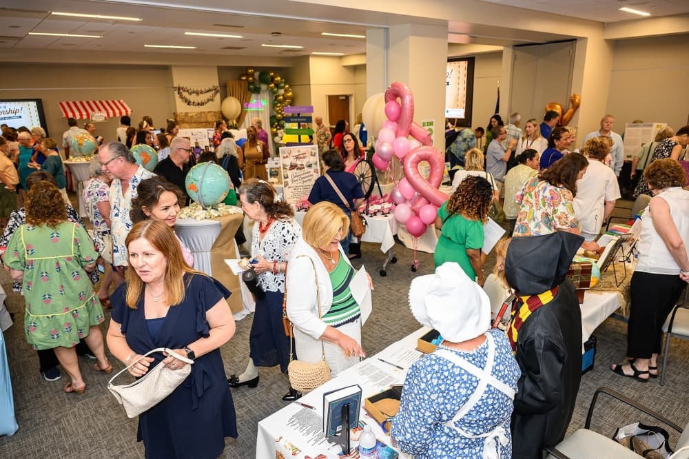 A large group attends an anniversary celebration
