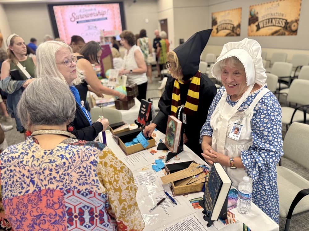 people in costume meet and greet at an event