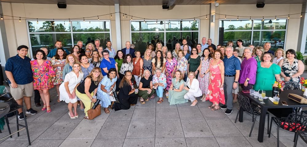 A large group assembles for a staged photo