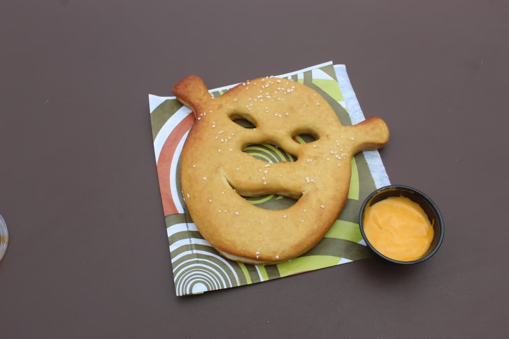In Shrek’s Swamp Snacks there are a few options including a Shrekzel, which includes a freshly baked Shrek pretzel with nacho cheese sauce. Other options include a turkey leg and Donkey’s Cookies & Cream Waffle. (Samantha Douty/Community Impact)