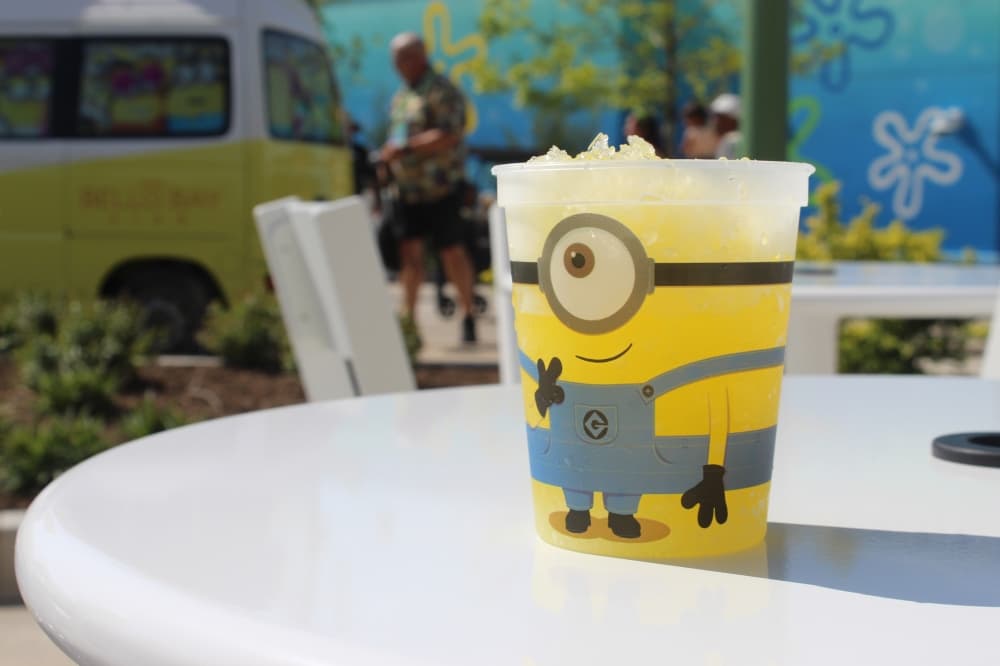 The pineapple flavored Yellow Minion Shaved Ice is offered at Bello Bay Boutique and Bites. The quick-bite stop also offers popcorn and a mac & cheese cone. (Samantha Douty/Community Impact)