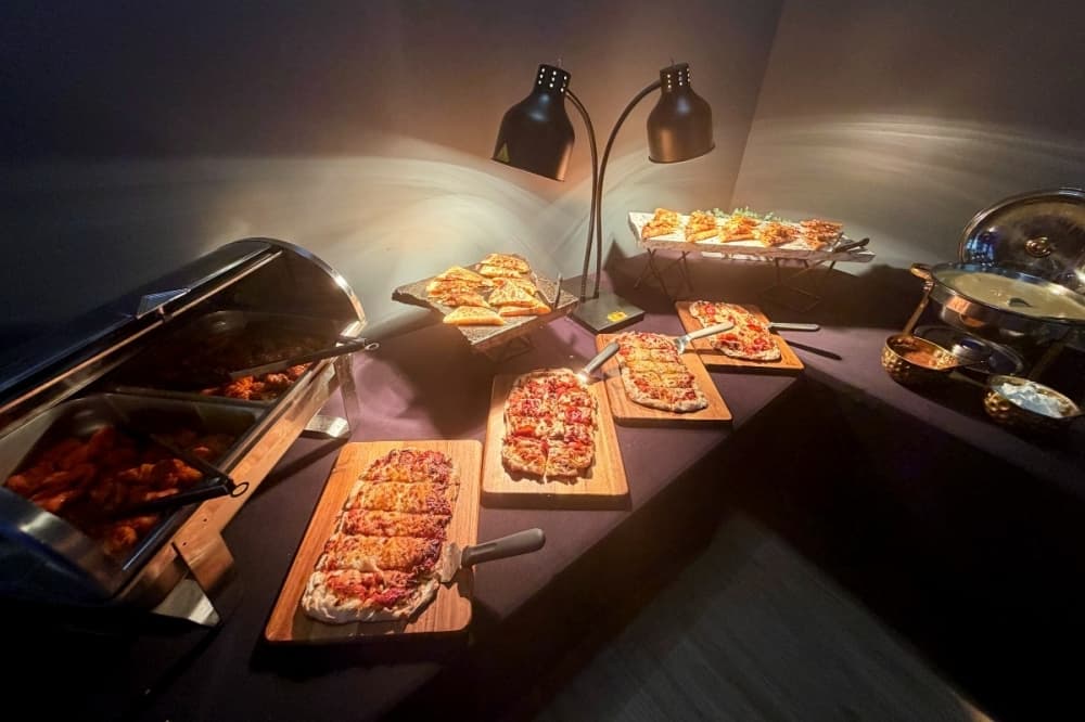 Crush It! Sports Lounge provides buffet options for group parties, such as this one June 29 for a car rental company. (Cody Thorn/Community Impact)