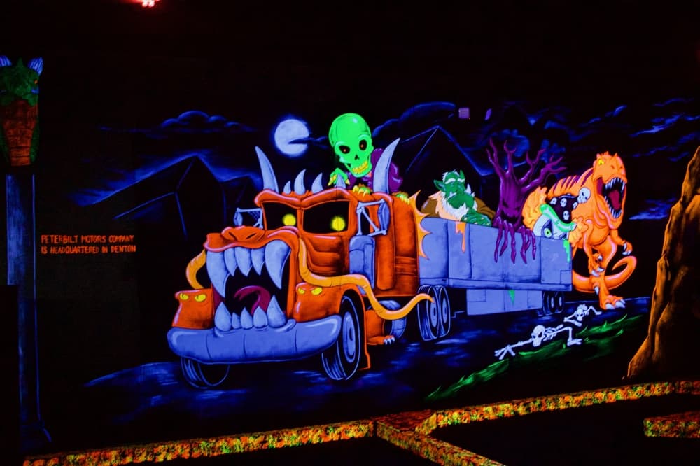 One of the murals references the Peterbilt Motors company, which has its headquarters in Denton. (Adam Doe/Community Impact)