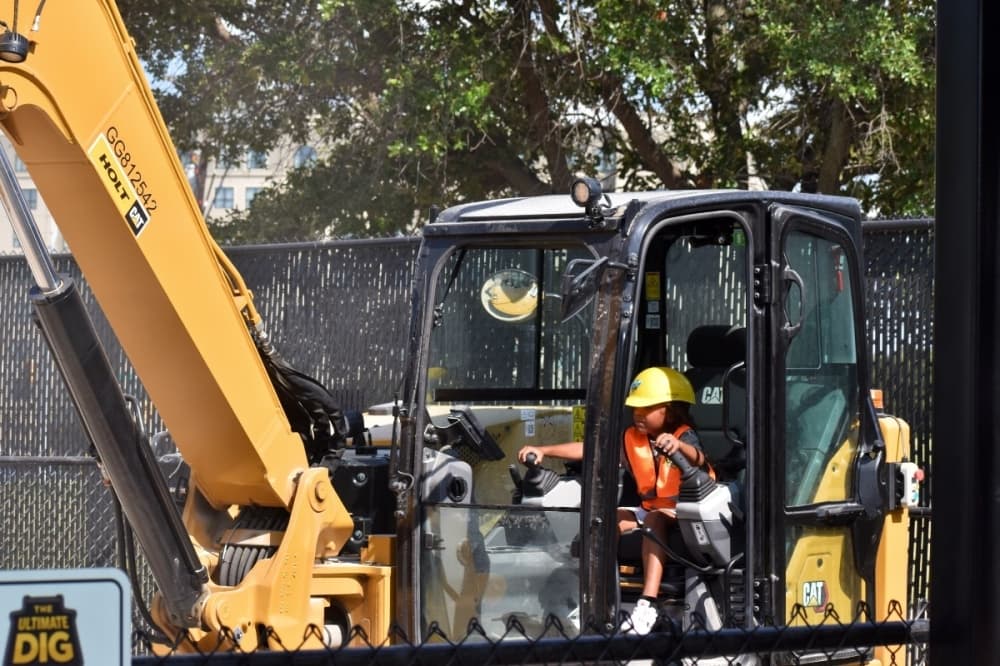kid using excavator 