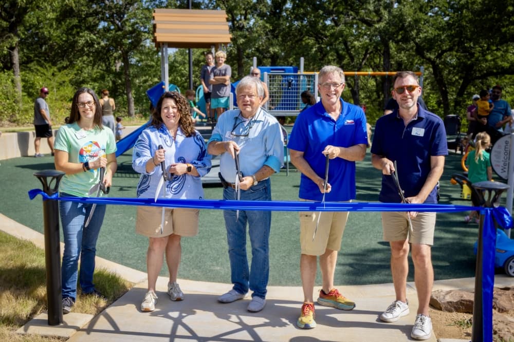 From left, Denton City Council members Suzi Rumohr, Jill Jester, Joe Holland, Chris Watts and Nick Stevens cut the ribbon at the new Villages at Carmel Park. (Courtesy city of Denton)