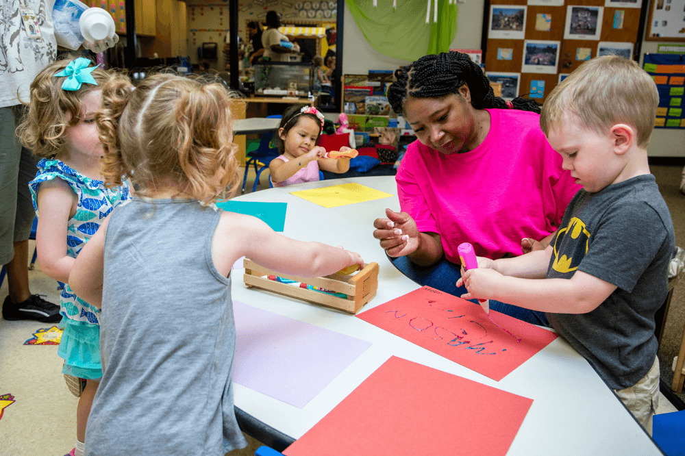Future elementary teachers participating in hands-on classroom instruction through Tarrant County College's teacher education pathway.