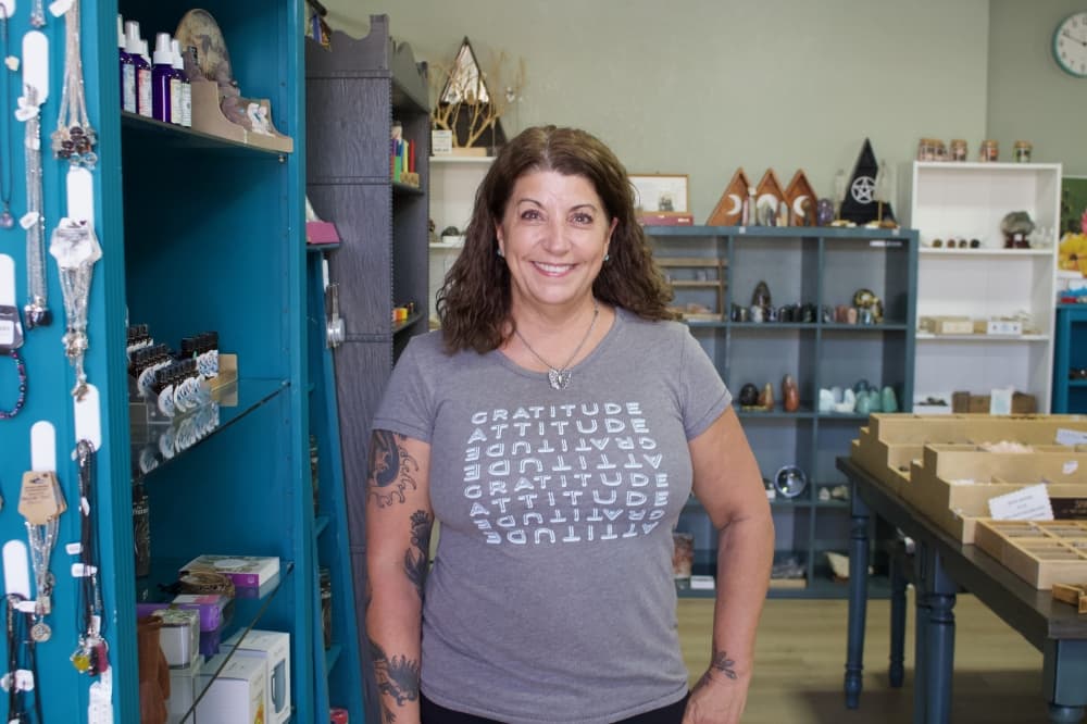 a portrait of a woman in a store