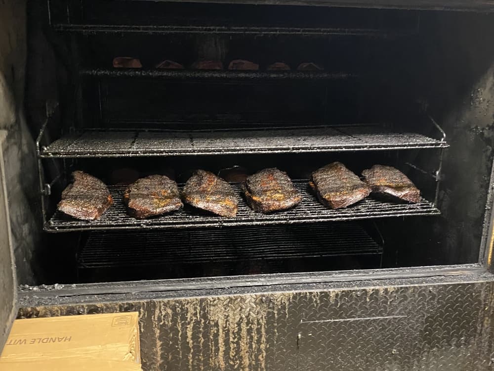 Feedstore BBQ is known for its brisket, which is smoked in-house, wrapped and then served sliced or chopped.