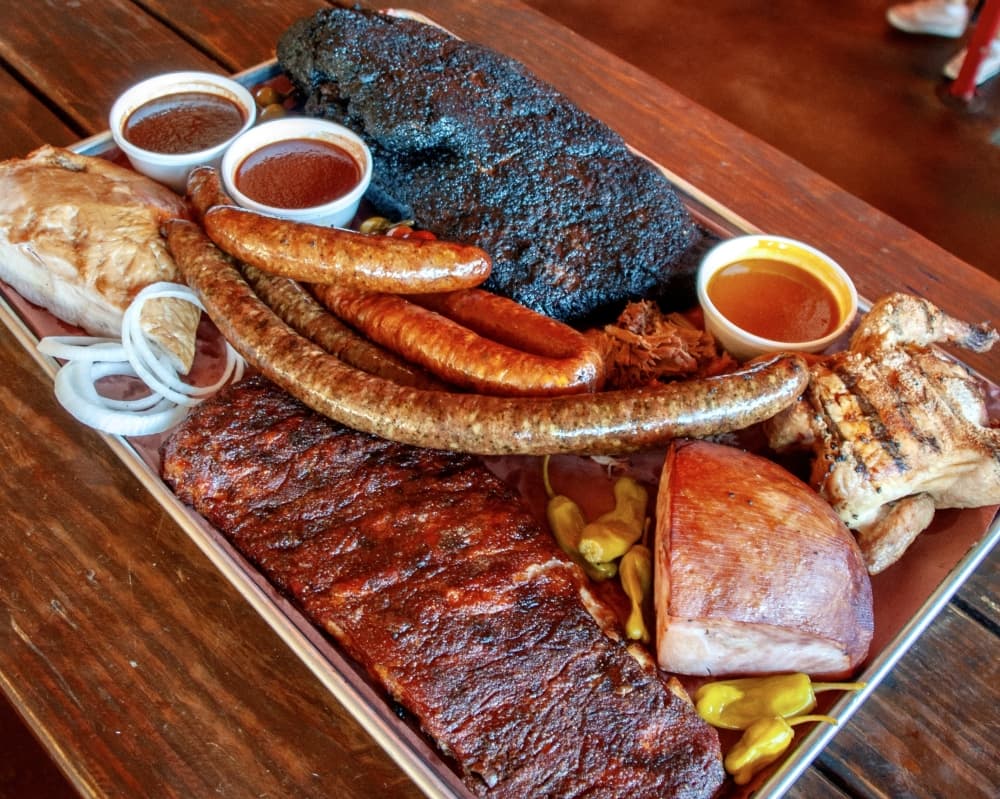 Feedstore BBQ's menu includes its signature ribs, brisket, custom-made sausage, chicken and turkey.