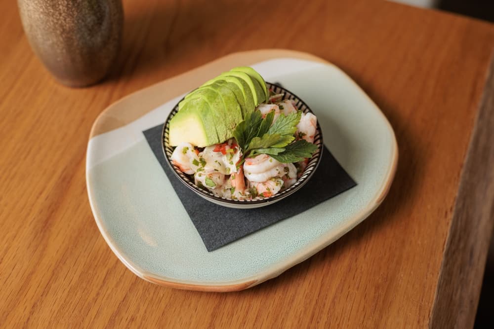 Field & Vine, the restaurant at The Clara Hotel, offers a variety of foods like its Clara Ceviche that's made with shrimp from the Texas gulf. (Courtesy of Greg Ceo Studio)