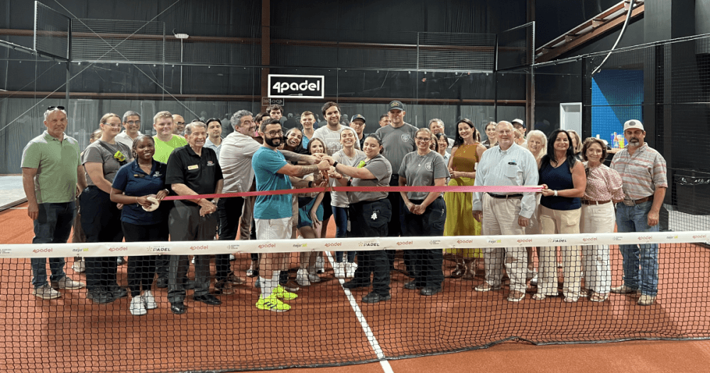4Padel's ribbon cutting featured members of the community and the BCS Chamber of Commerce. (PD Ward/Community Impact)