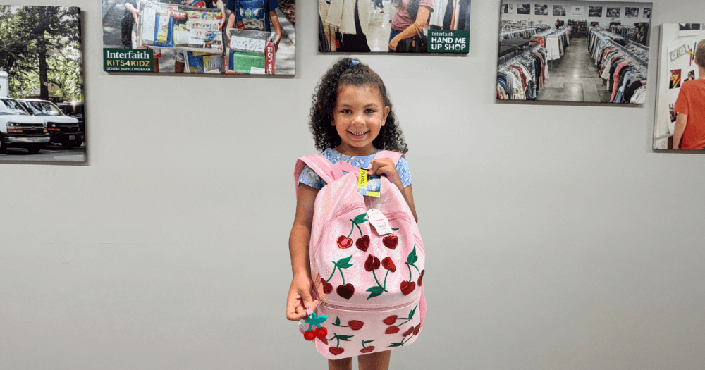 child with backpack