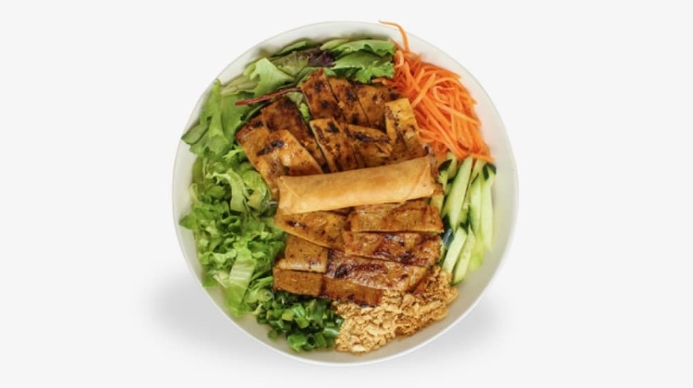 The vermicelli is served with protein, cucumber, spring mix, peanuts, fried onions and house special sauce. (Courtesy Bites & Basil)