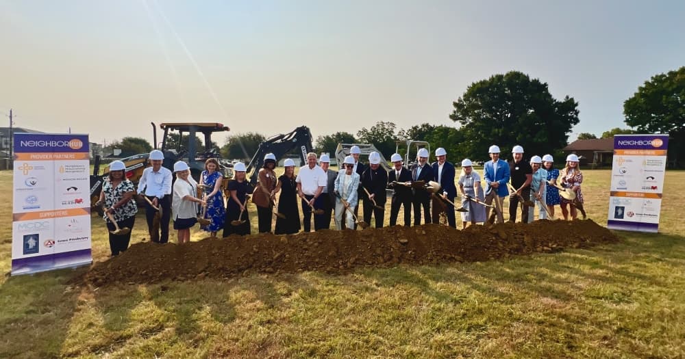 Nonprofit officials and community leaders participate in a groundbreaking ceremony on Aug. 4 for the Collin County NeighborHub project. 