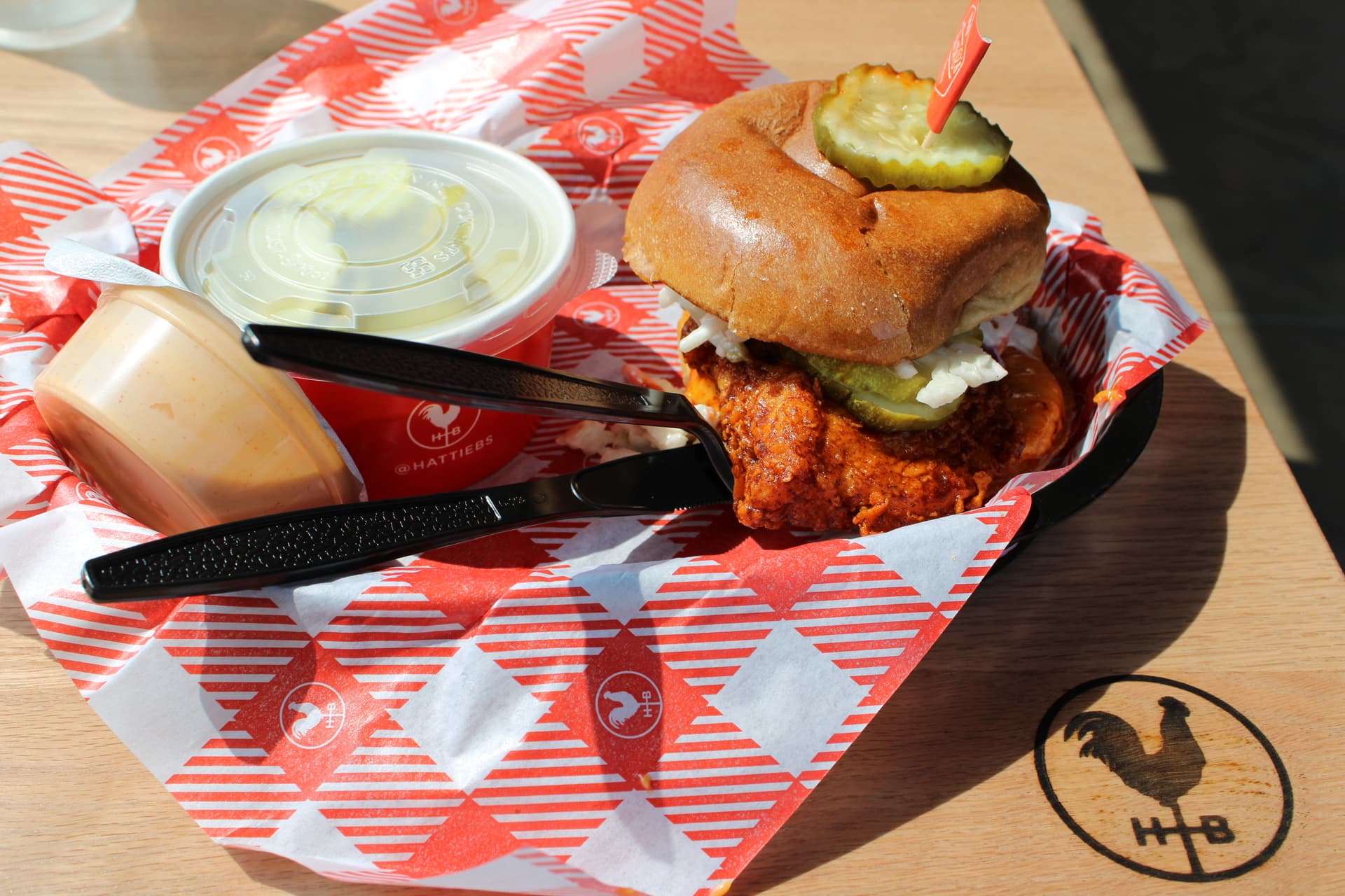 Hattie B's offers chicken sandwiches with spice levels from mild to "Shut the Cluck Up!". (Patricia Ortiz/Community Impact)