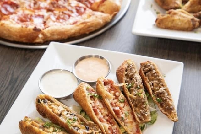 Spectators Bar & Grill opens 4th location in Katy