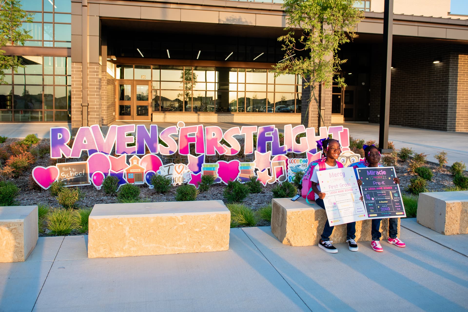 Students pose outside of Romer Elementary School for the campus's first day of class Aug. 12. (Sara Carpenter/Community Impact)