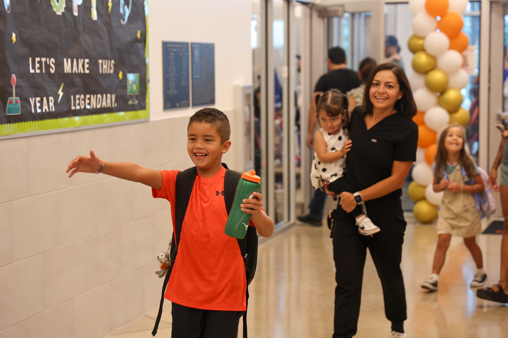 A parent walks her student into school at Lee Martinez Elementary School. (Courtesy Hutto ISD)