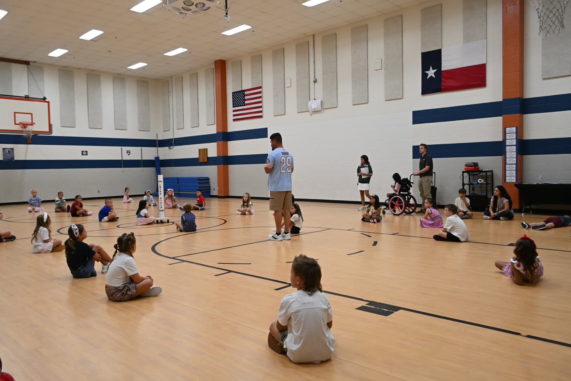 A gym teacher discusses "The Impossible Shot" at O.C. Taylor Elementary.