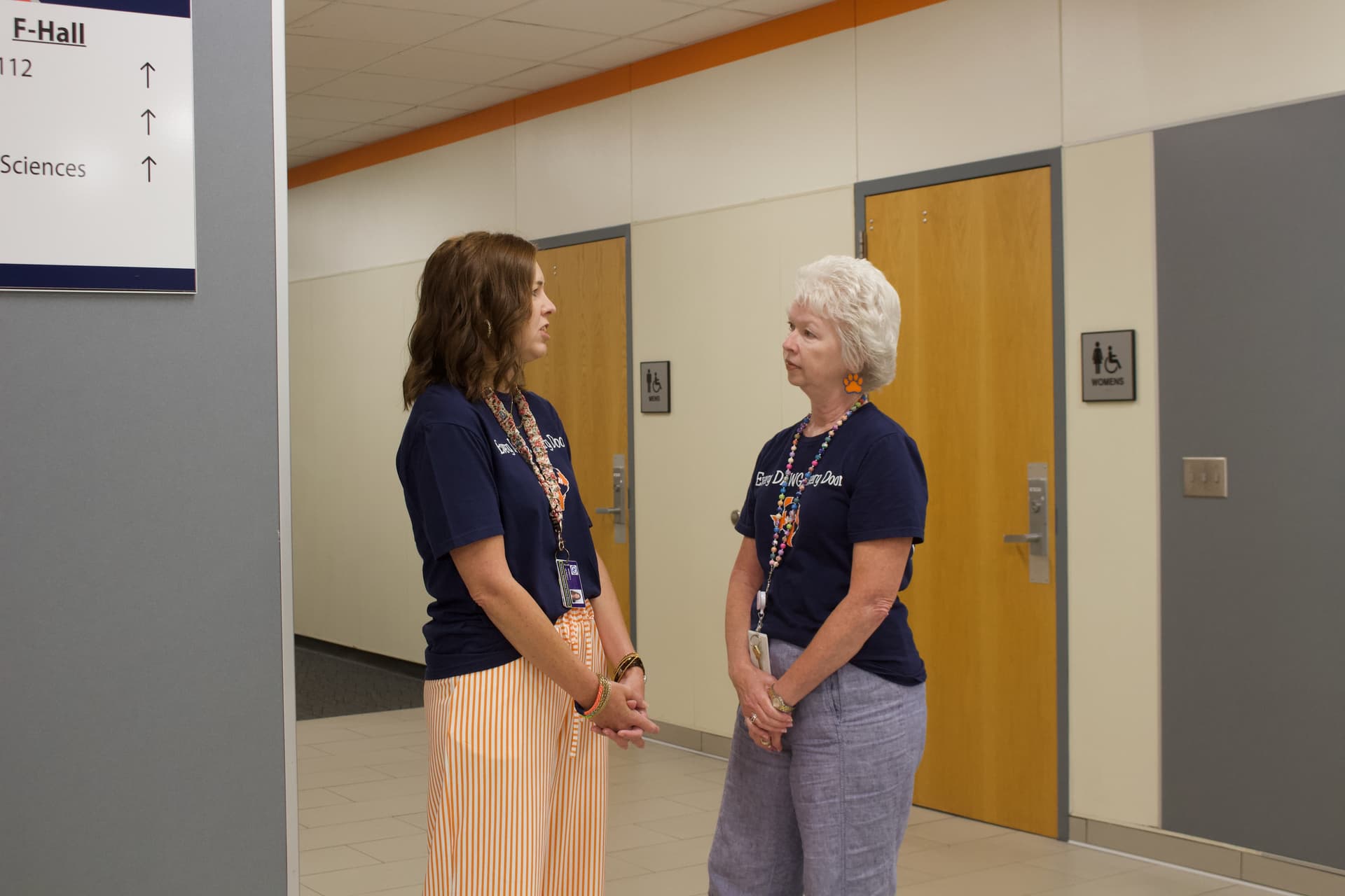 teachers in a hallway