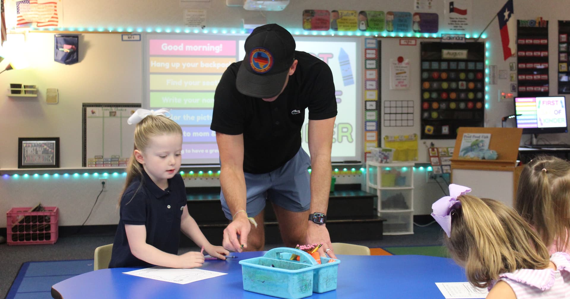 A parent speaks to a student at Norton elementary School on Aug. 13. 