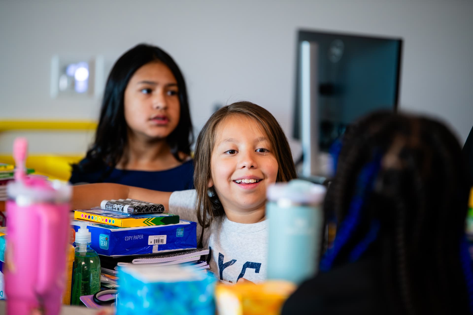 Students laugh in class at Borman Elementary School during the first day of school on Aug. 13. (Sara Carpenter/Community Impact)