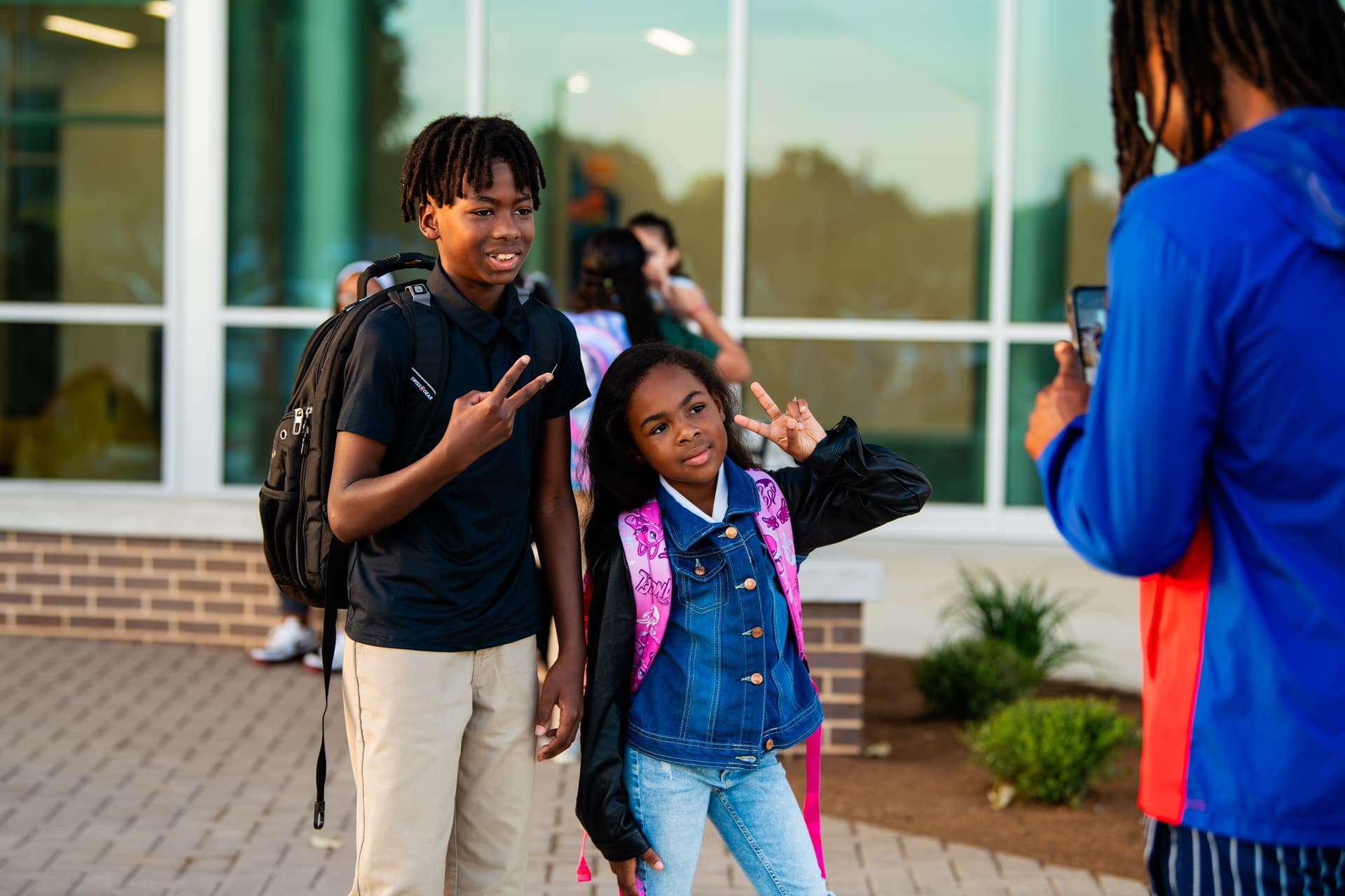 Students pose for a photo at Borman Elementary School during the first day of school on Aug. 13. (Sara Carpenter/Community Impact)