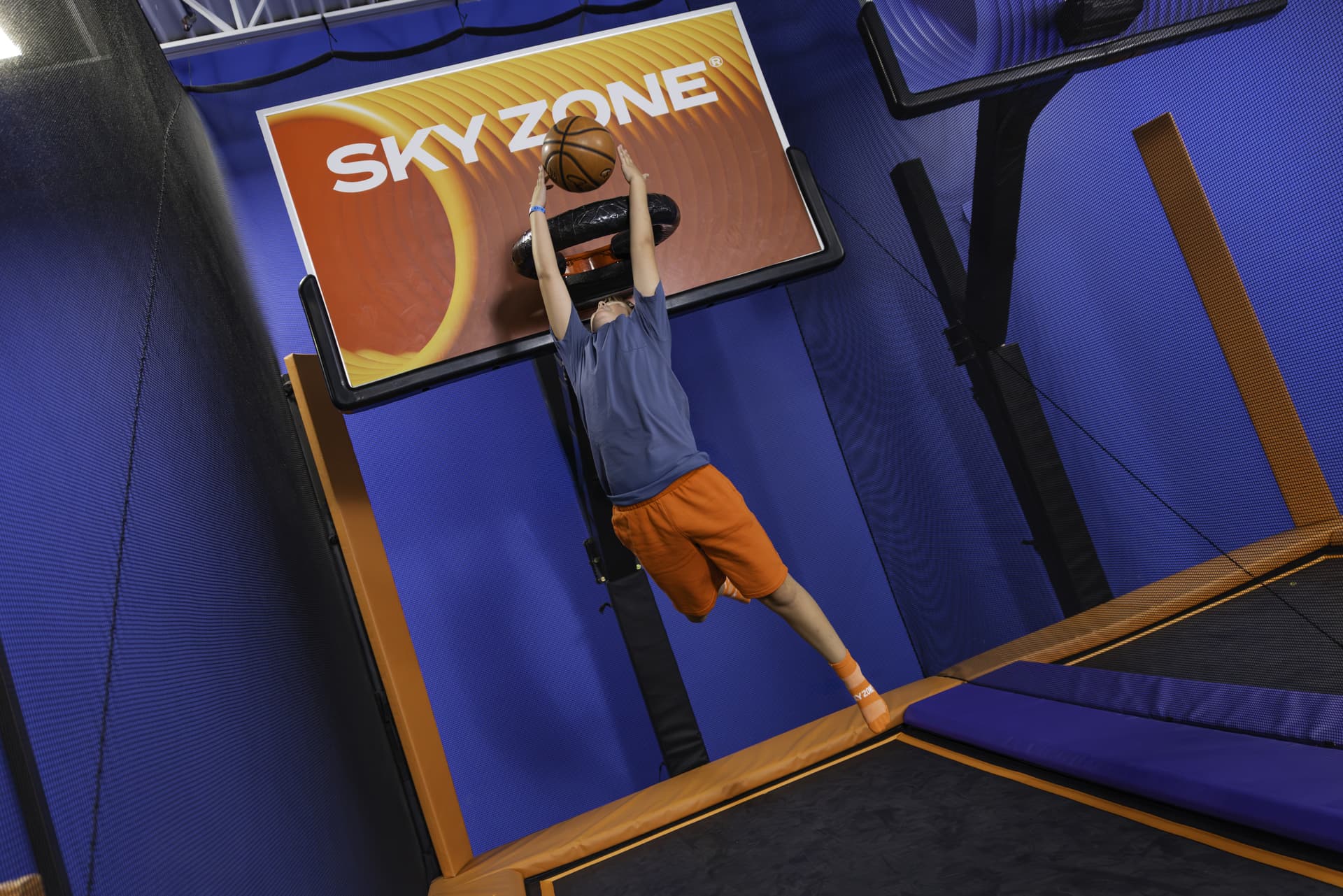 One of Sky Zone's activities is trampoline basketball.