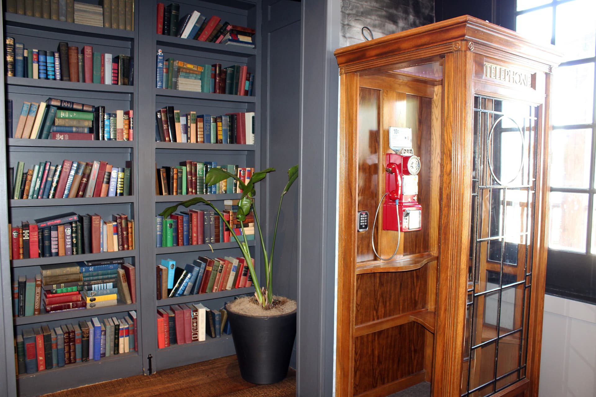 Entrance to Rare Books Bar, a Frisco speakeasy, is gained through J. Theodore via a password and hidden door system. (Karen Chaney/Community Impact)